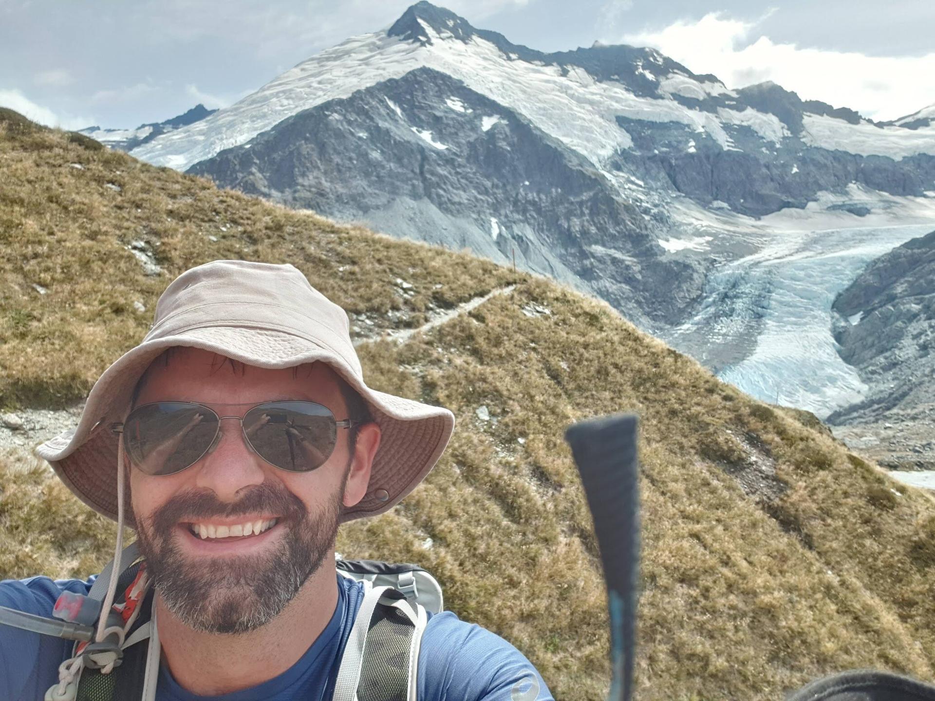 Darragh ORiordan taking a selfie with the Dart Glacier in the background.